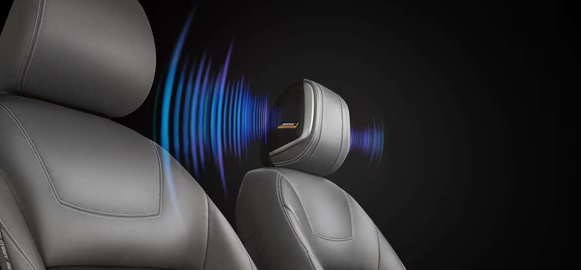 Les haut-parleurs intégrés dans l’appuie-tête du conducteur du Nissan Kicks 2025.
